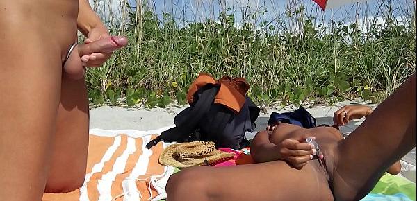  Public beach jerk off. Big cumshot on Aisanippie. Voyeurstyle.